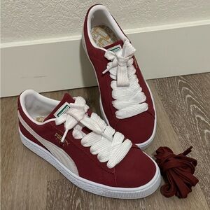 Burgundy pumas women’s size 8
